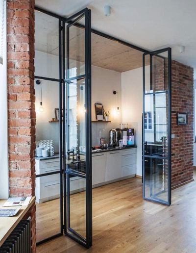 black steel internal French doors with screen wine storage UK manufacturer London