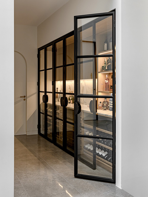 black-steel-internal-french-doors-with-screen-wine-storage-UK-manufacturer-London black steel internal French doors with screen wine storage UK manufacturer London