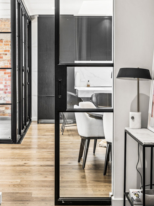 black-steel-pocket-sliding-doors-living-room-London-UK-manufacturer black steel doors sliding internal pocket London UK manufacturer